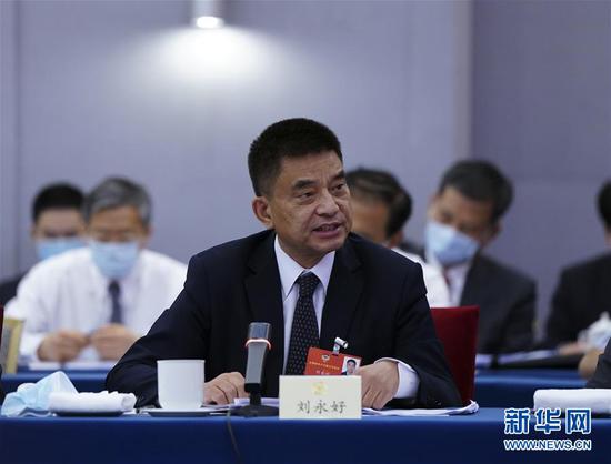  5月23日，全國政協(xié)委員劉永好在政協(xié)聯(lián)組會(huì)上發(fā)言。新華社記者 謝環(huán)馳 攝